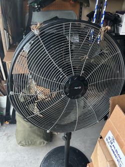 Heavy duty metal fan used in garage or house
