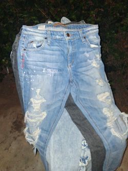 Distressed Light Wash Denim Jeans