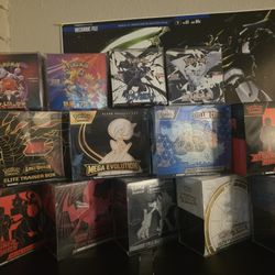 Lots Of Pokémon Boxes And Tins