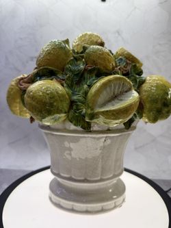 Beautiful decorative Italian Majolica ceramic basket of lemons, Used as a centerpiece often produced in regions like Capodimonte. Hand-painted porcela