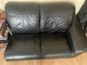half of a black couch