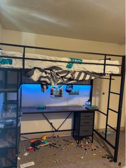 Twin metal loft bed w/ mattress ! With desk, led lights and drawers .