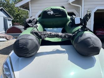 Water Master Navigator IV inflatable fishing pontoon boat with waders