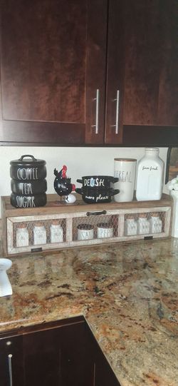 Hobby lobby farmhouse chicken wire shelf.
