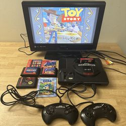 SEGA GENESIS 1 - MODEL 1601 - 16-BIT VIDEO GAME CONSOLE W/ 4 GAME CARTRIDGES, TV WIRE, POWER CORD, & 2 GAME CONTROLLERS 