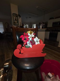 Red Wooden Christmas Sleigh with Faux Poinsettias