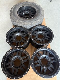 5 good condition wheels including spare tire