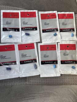  RadioShack 100μF Electrolytic Capacitor  , Axial Lead  $Five dollars for all of them $ Pick up location surrounded by Greenhouse Rd., Fry Rd 