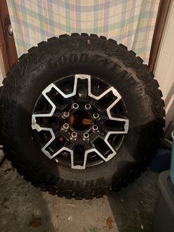 NEW Goodyear Wrangler Off-Road Tire with Black & Silver Rim - Size 305/17R18