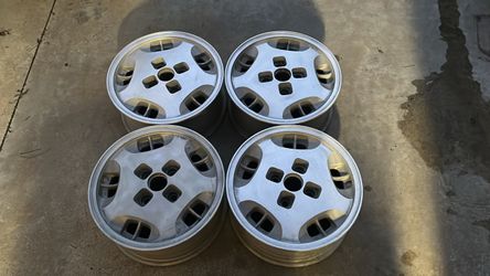 Four Nissan 300zx 15 inch Aluminum wheel 4 on 114.3mm-