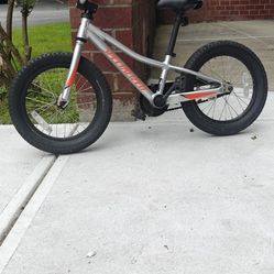 Used Specialized 16 inch unisex mountain bike.