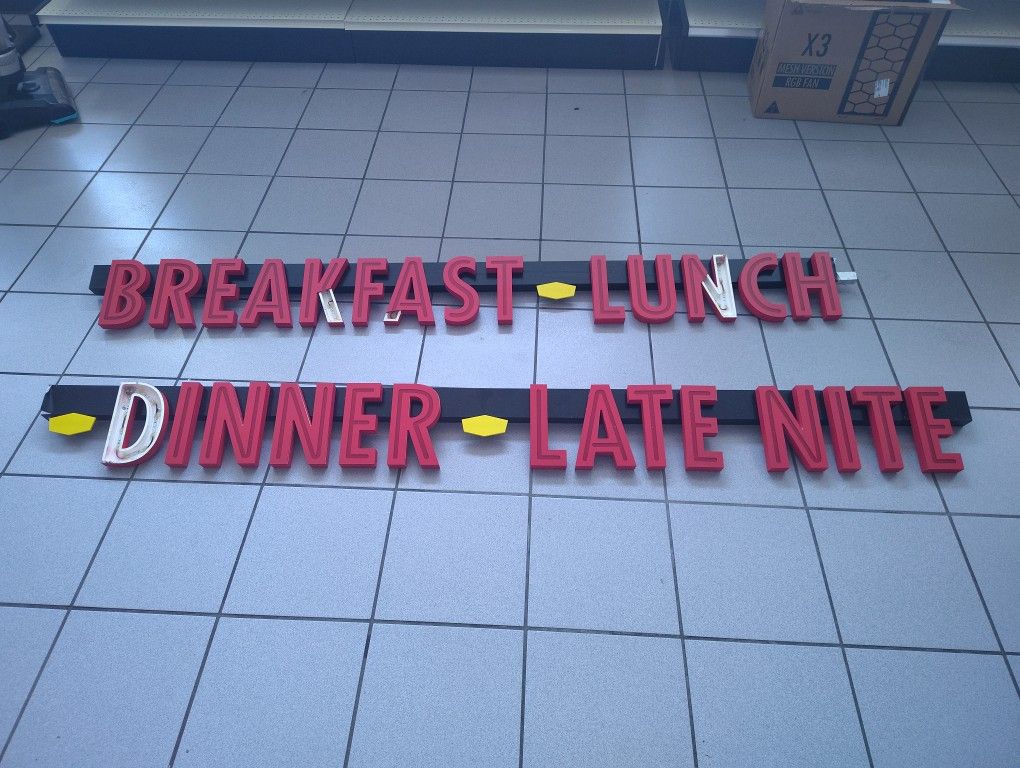 Backlit Sign From Denny's On Front Street
