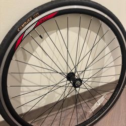 This is a 700c road bicycle wheel featuring a Compass brand tire.  28 x 15/8 x 11/8.. $50 Tire only