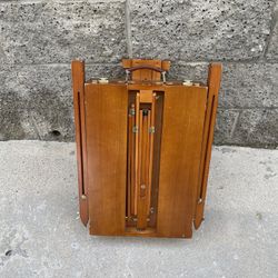 foldable French-style wooden easel. 