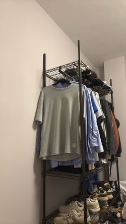 Clothing rack with shelves and hanging rack