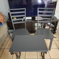 Wooden Chairs and Metal Table