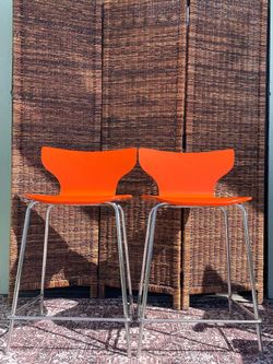 Pair of Mid-Century Modern Style Orange Acrylic Counter Stools.