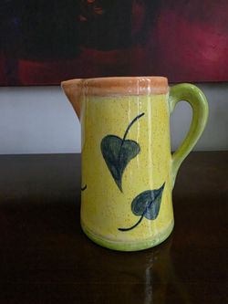 Hand-painted ceramic pitcher with heart-shaped leaf motif by Pizzato