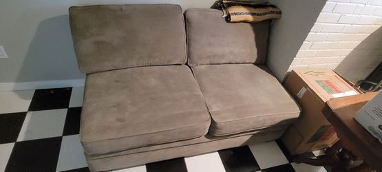 Love seat couch/fold out