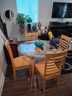 Glass dining table with 4 chairs