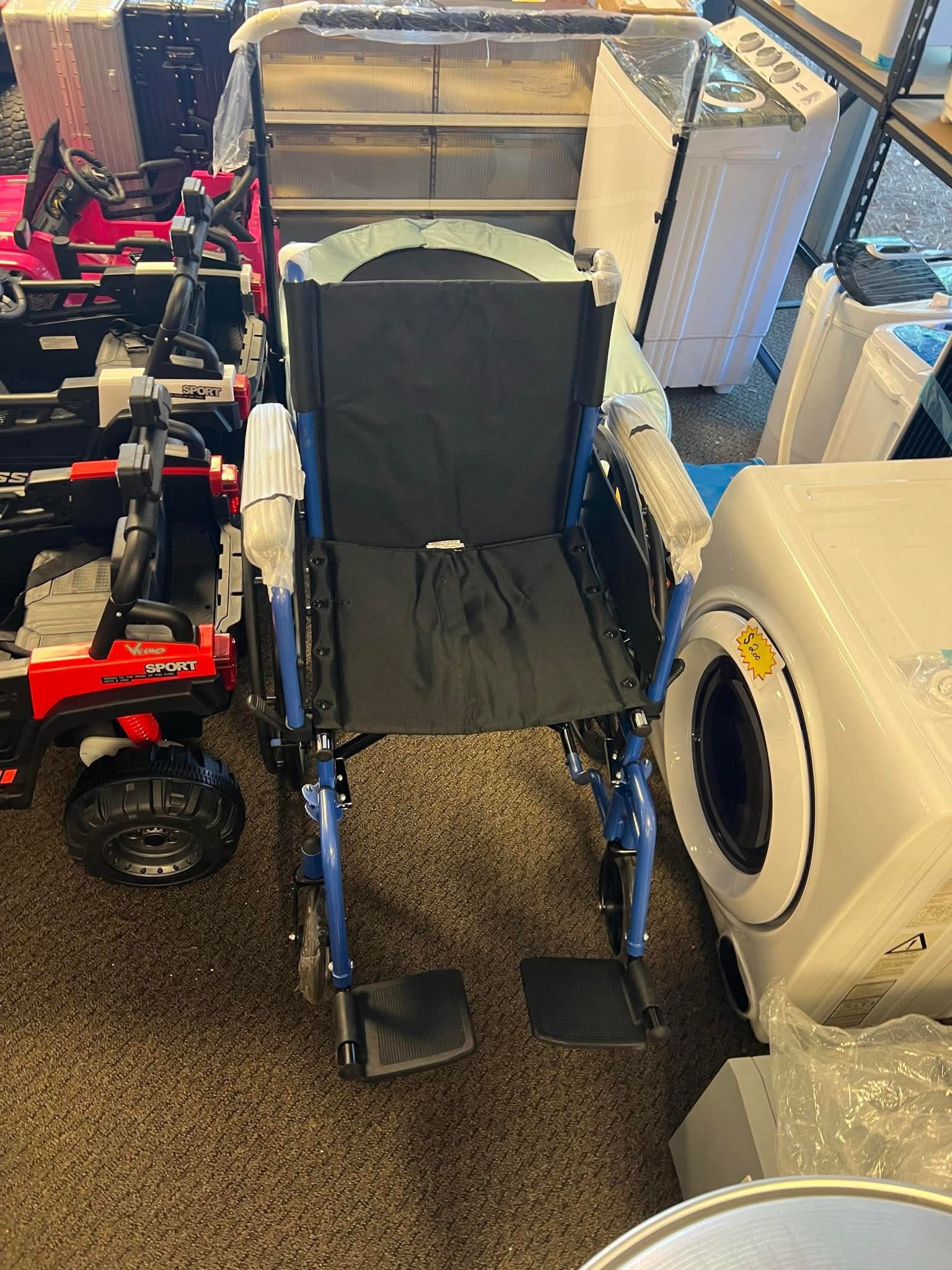 Pediatric Wheelchair with 12-inch Wide Nylon Seat with Safety Belt, 250-pound Weight Capacity, Telescoping Handles, Arms to Desk with Backrest