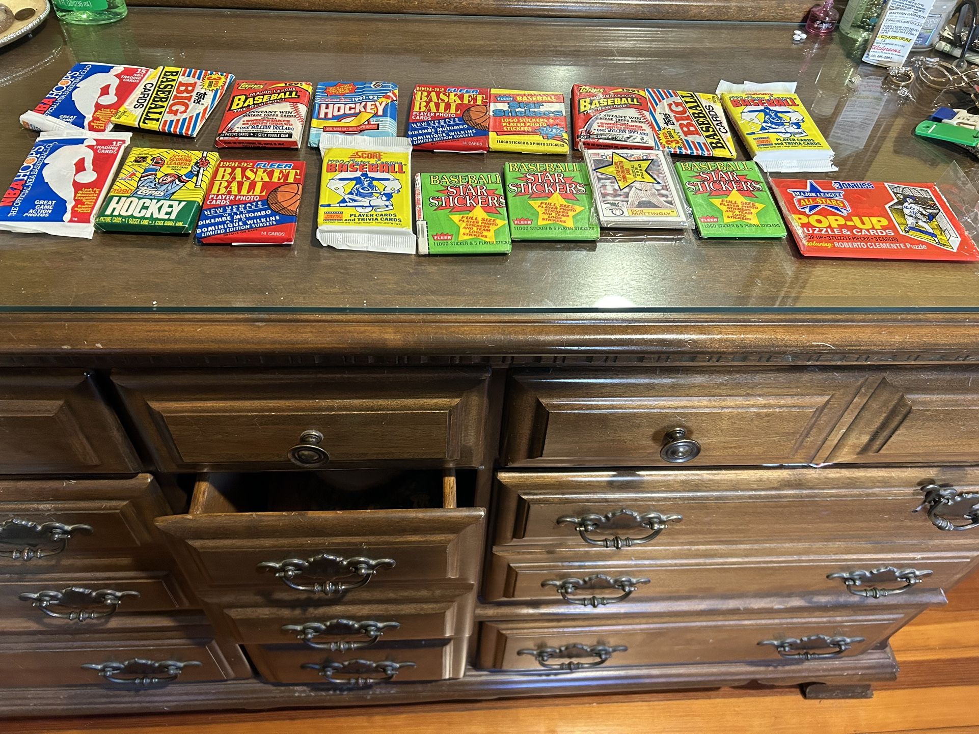 40 packs of unopened baseball and other sports from 80’s and 90’s
