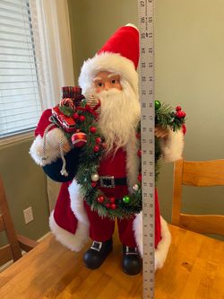 Santa large 24 inch tall Santa figure. Holding a sack with red firetruck & Christmas greenery. Vintage .