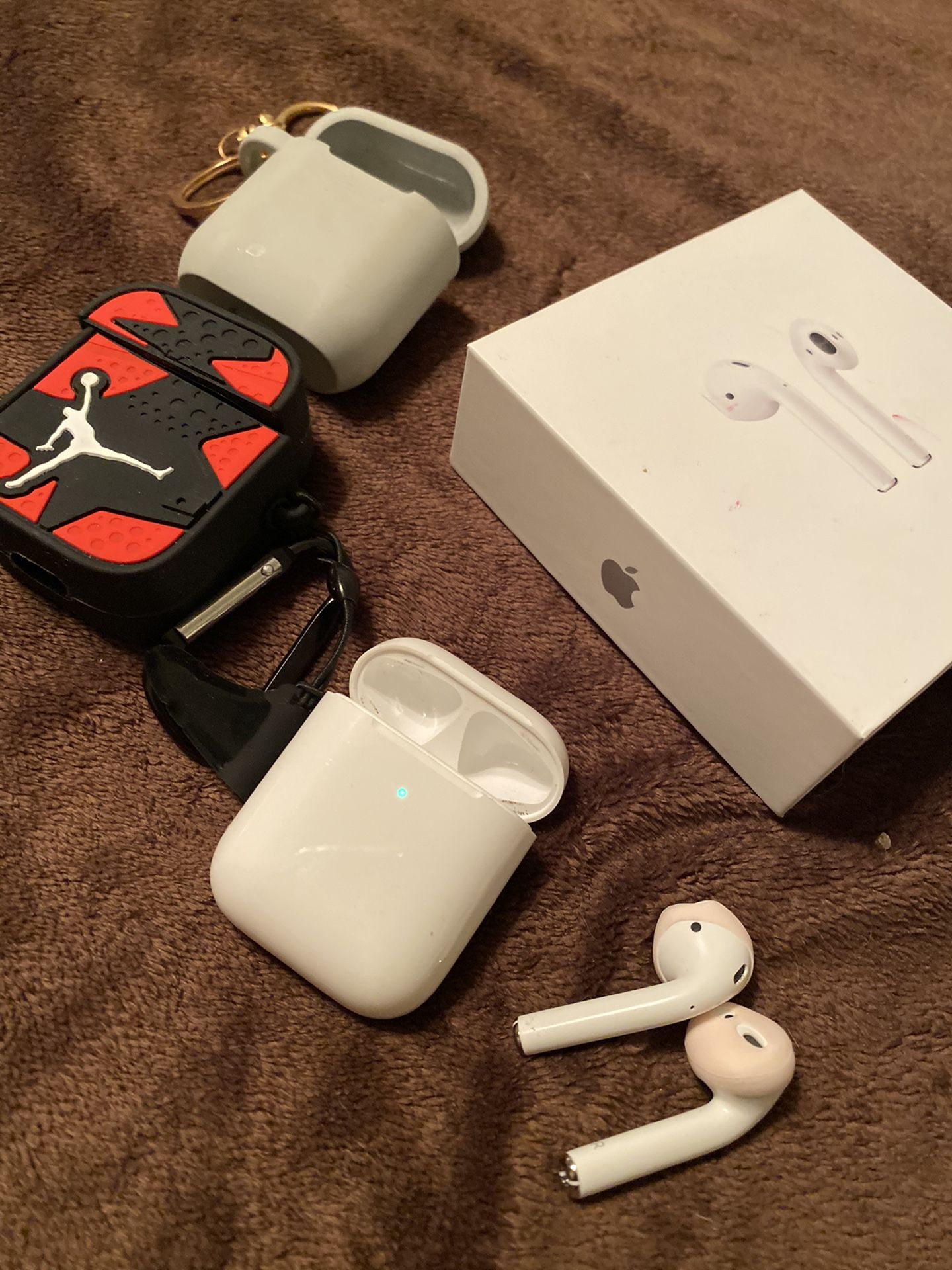 Original Apple AirPods 2 wireless charging box with 2 cases