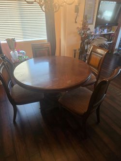 Wooden dinner table and chairs