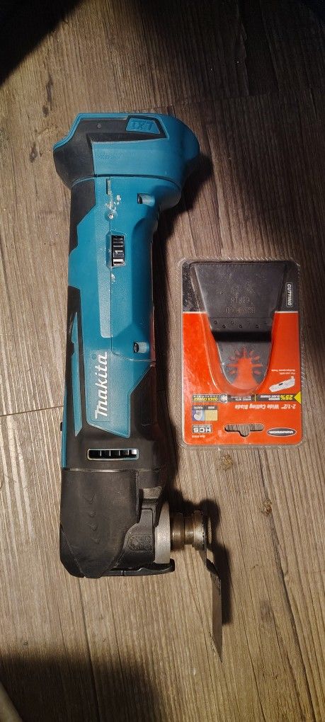 Makita Oscillating Multi Tool - tool and extra attachment only