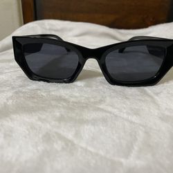 MIU Woman’s Sunglasses 