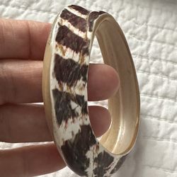 Abstract Snake Like Shell Bangle. so much detail from the inside to the curving smooth design.