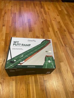 Golf putting mat