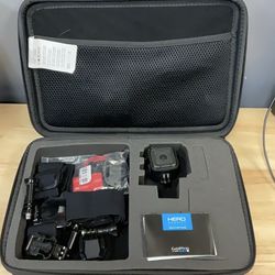 GoPro hero four session action cam with head mount and accessories