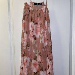 Pink floral midi dress with padded bust, adjustable straps, and a flowy skirt  Size 4