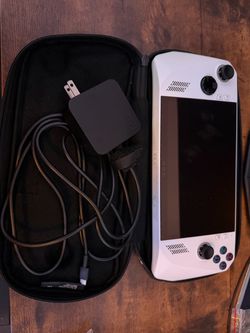 Rog Ally Z1 Extreme with a dock original case and charger