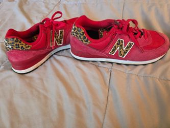 Red/leopard New Balances shoes