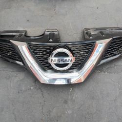 2014-2016 Nissan Rogue Complete Grill With Emblem Oem. 