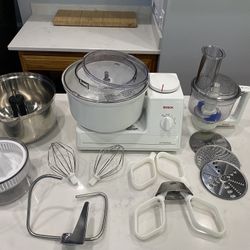 Mixer- Bosch Universal 700 Watt Motor AND citrus juicer, food processor, whip cream bowl, attachment