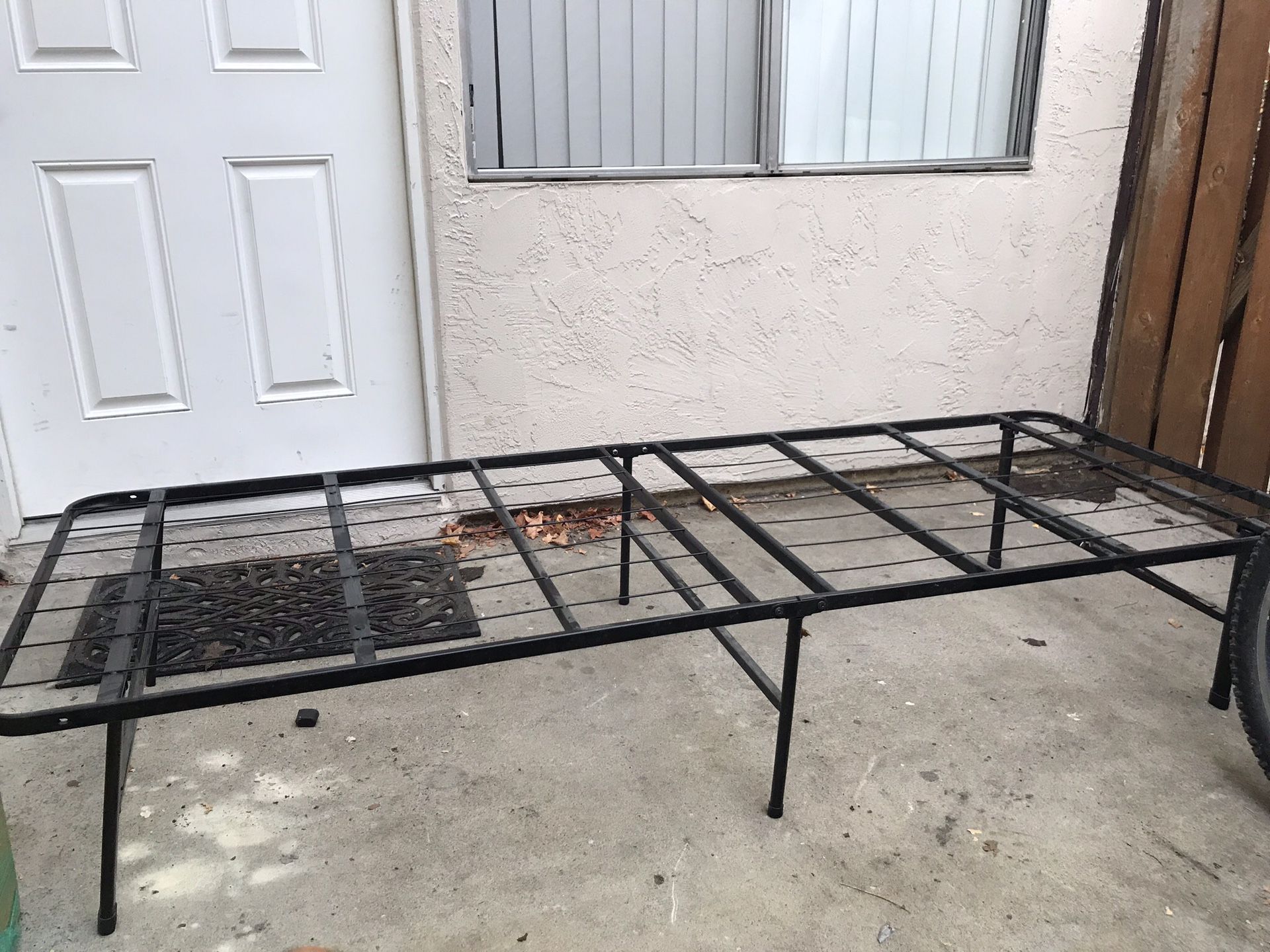 Frame with twin mattress
