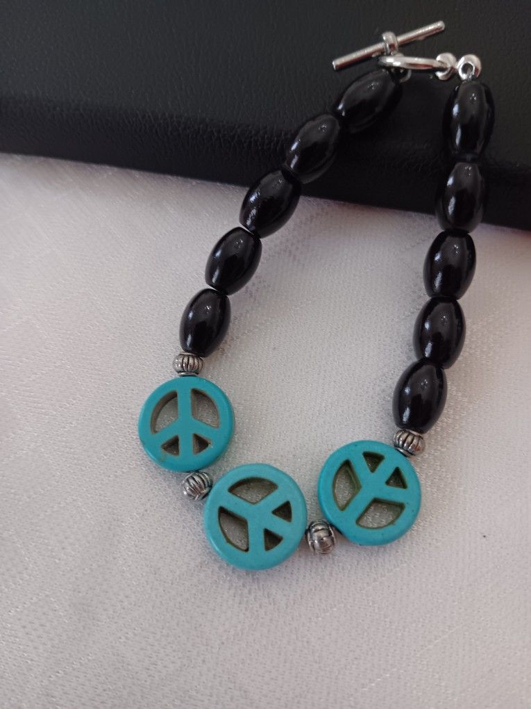 Unique Handcrafted Turquoise Peace Beads And Black Glass Beaded Stretch Bracelet