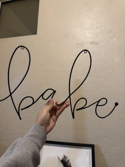 “Babe” Sign