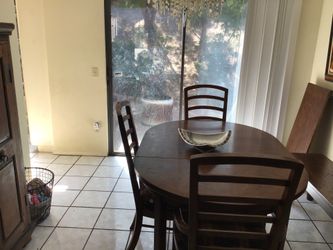 Wood dinning room table with 4 chairs