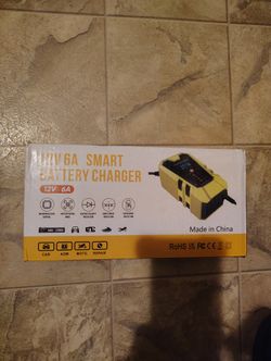 New In Box Smart Battery Charger