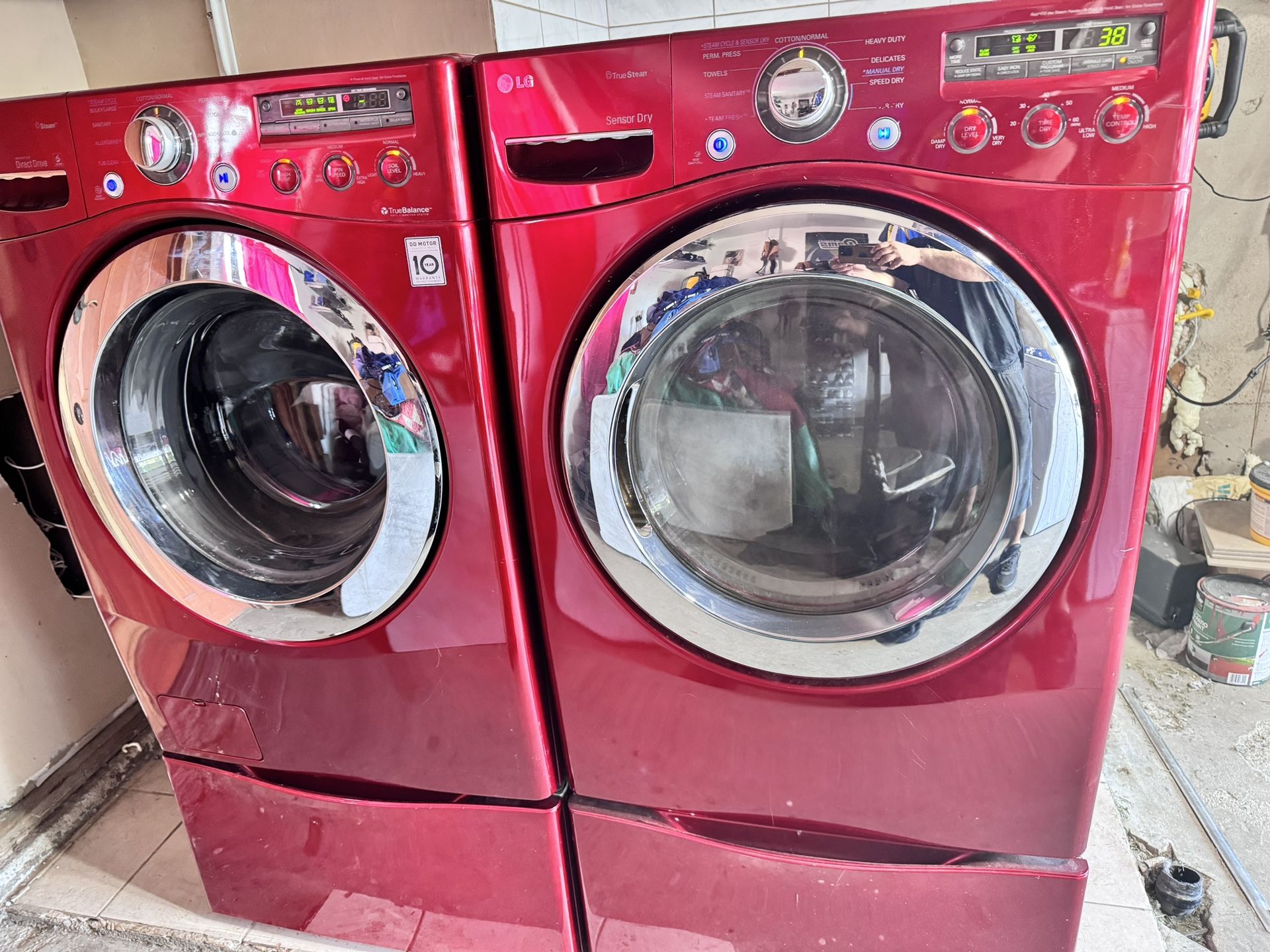 15 month old burgundy LG washer & gas dryer in great conditon both are steam aiption w/ pedestals  washer is a 4.3 cf capacity and dryer is a 7.1 cf c