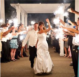 Two boxes  of gold sparklers