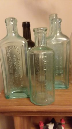 Antique hand blown medicine bottles