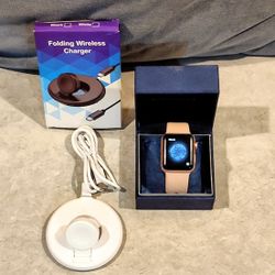 APPLE SMART WATCH SERIES 2 ROSE GOLD ALUMINUM CASE & SILICONE BAND WITH CERAMIC BACK. INCLUDES FOLDING WIRELESS CHARGER & CORD. 