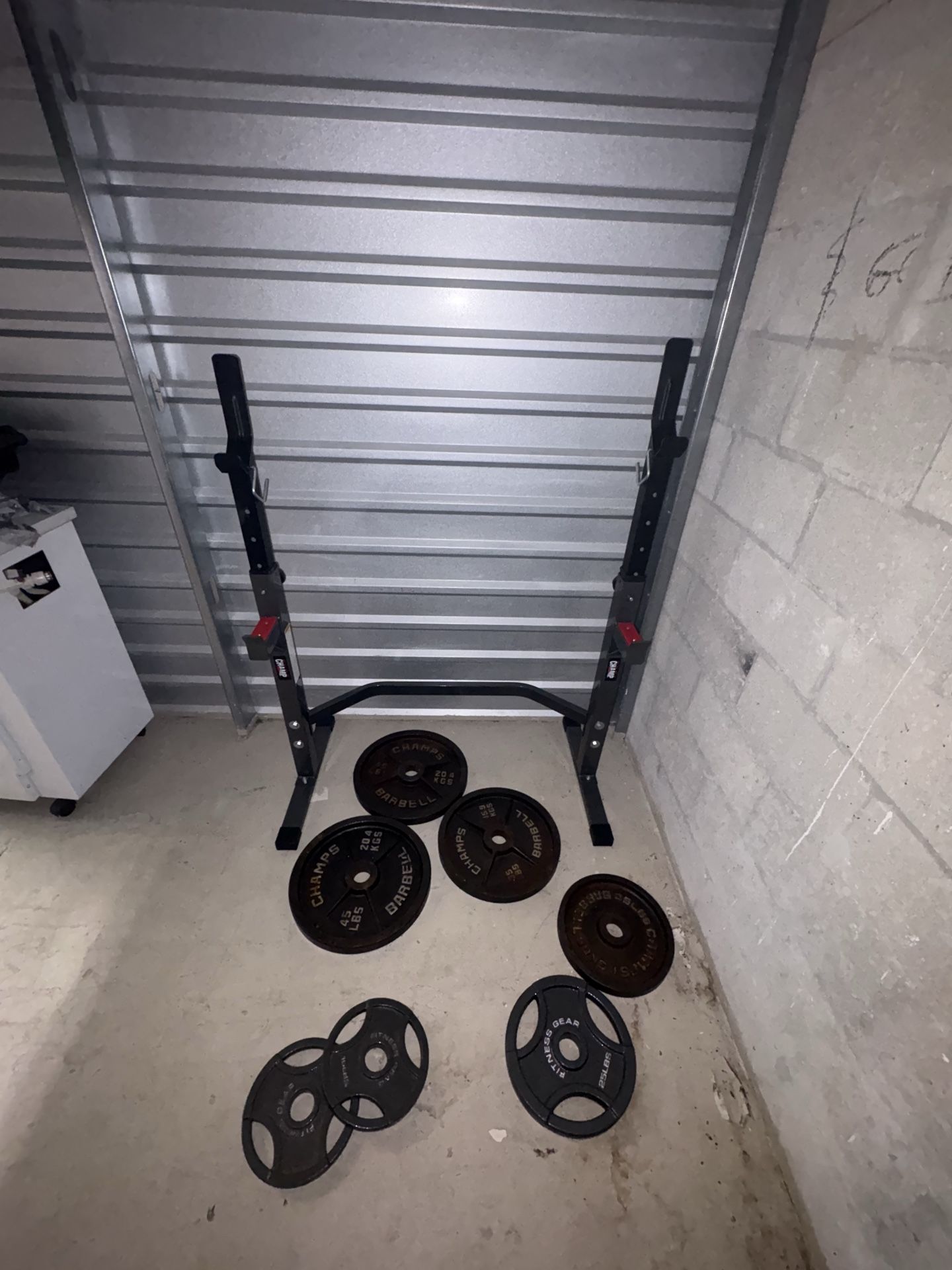 Rack and weights and bar