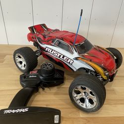 Traxxas Rustler And Two Amp MT Trucks